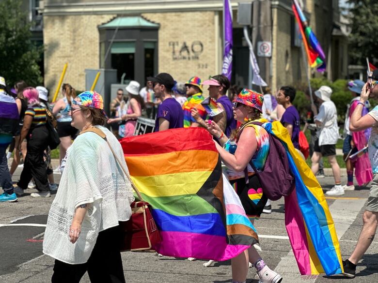 The sound of music and shouts of support from paradegoers filled the streets Sunday.