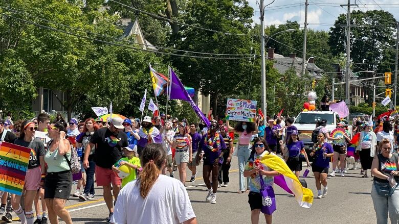 Sights at the parade included bright coloured flags and signage. Chants of affirmation for pride could also be heard.