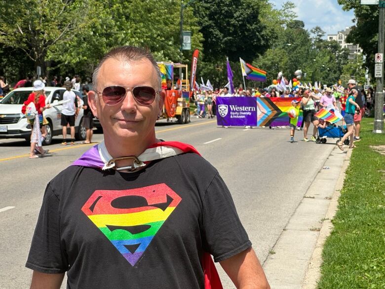 Deputy Mayor Shawn Lewis, the City's first openly gay elected official, attended the parade donning a bright rainbow cape and a festive shirt.