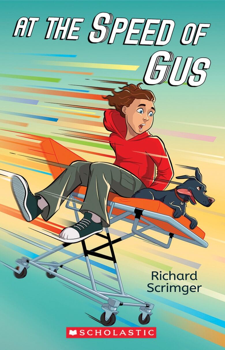 A book cover shows a boy in a red hooded sweatshirt sitting on a foldable bed on wheels with a dog, travelling at speed down a hill. 