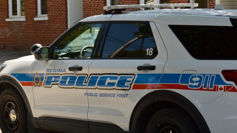 A vehicle with Regina Police markings, including the force's motto: Public Service First.