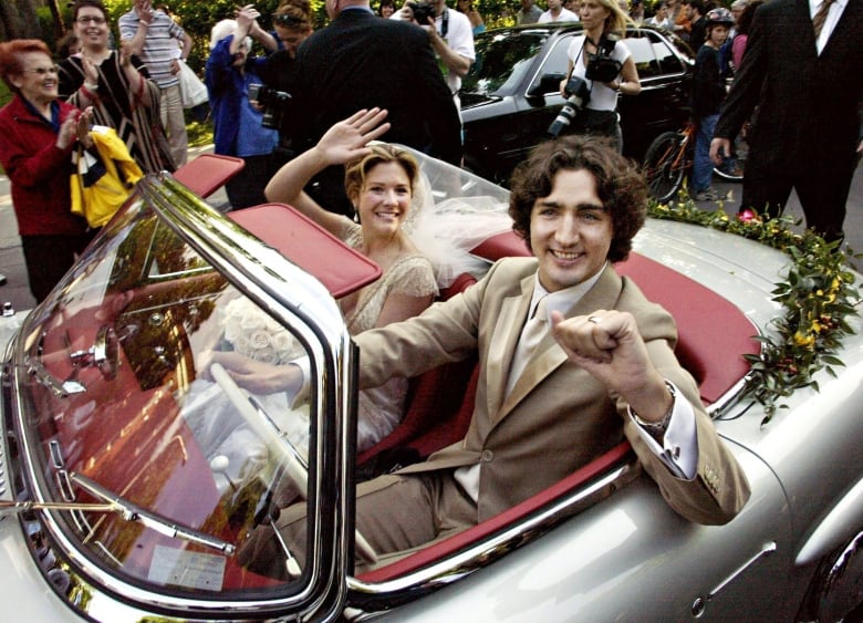 Trudeau leaves with his new bride in his father's 1959 Mercedes 300 SEL after their marriage ceremony in Montreal Saturday, May 28, 2005.