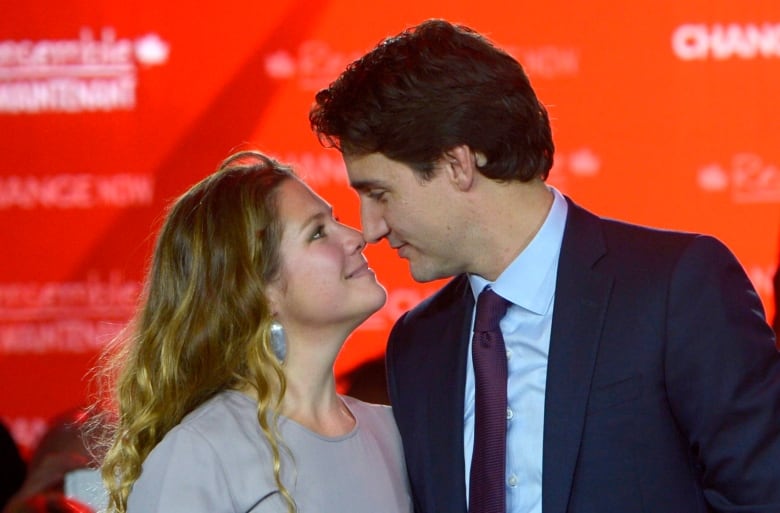 Trudeau and  Grgoire Trudeau have an intimate moment on stage following his speech at Liberal party headquarters in Montreal early Tuesday, Oct. 20, 2015.