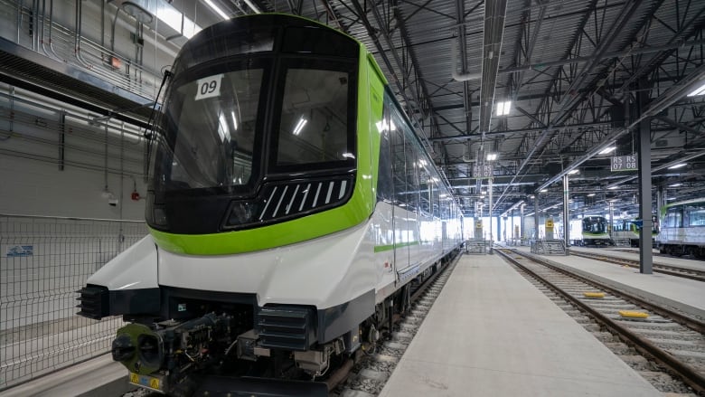 A train in a concrete building.