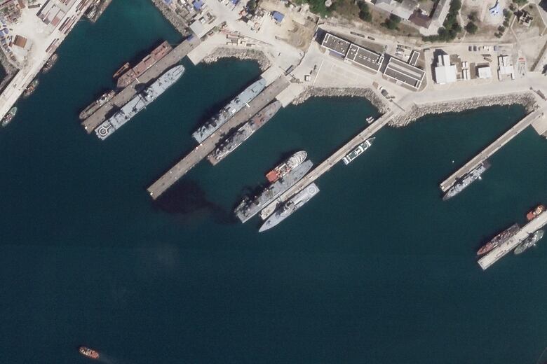 A satellite photo that appears to show the damaged Russian warship Olenegorsky Gornyak leaking oil, while docked at a naval base in Novorossiysk, Russia.