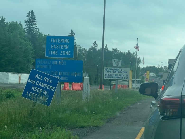 Signs at the border with Maine