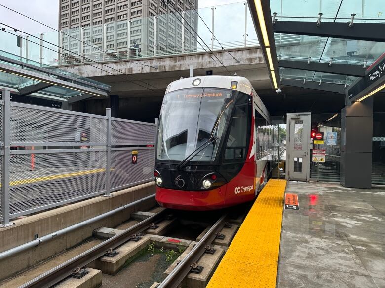 A light rail train entering the station. 