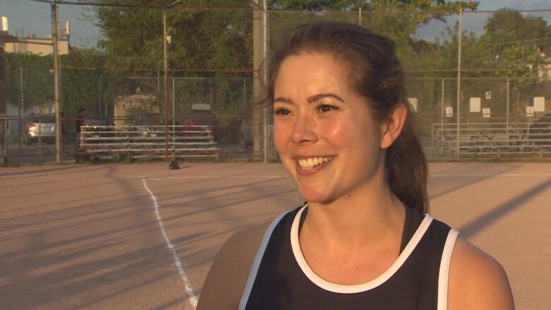 Kim Stemshorn smiles in the middle of the Dieppe Park softball field.