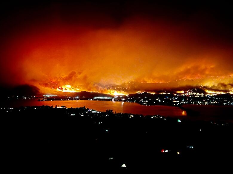 A wildfire is seen burning in Osoyoos, B.C.