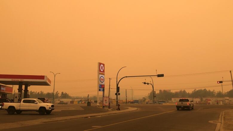 Smokey weather and a gas station. 