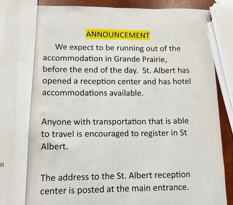 A sheet of paper with writing on it is labelled 'Announcement.'