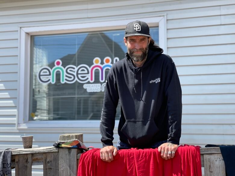 Man standing outside on a porch