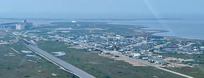 An aerial image of the Town of Churchill, with low buildings in the foreground.