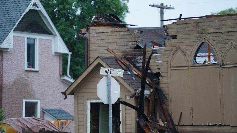 A shot of a church that has been damaged by a fire. 