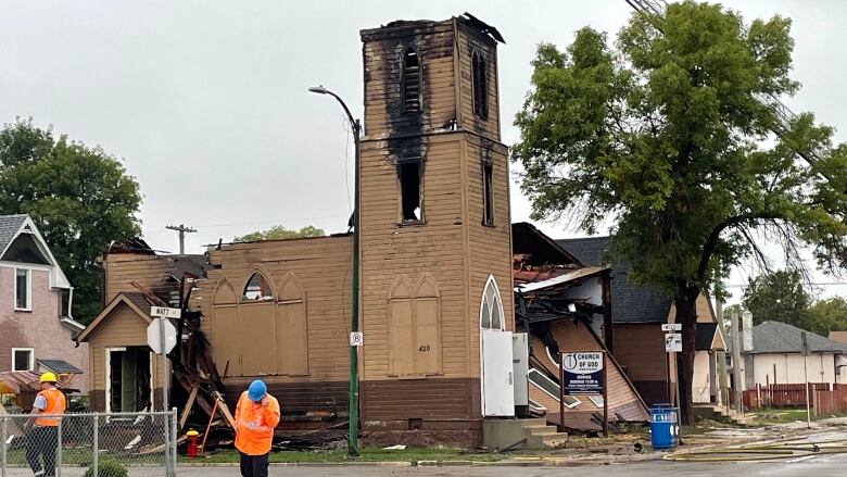 A church that has been badly damaged by a fire. 