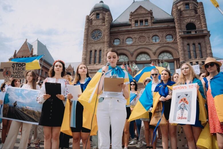 Sakhnatska has led several pro-Ukrainian rallies in Toronto (such as this one by Queen's Park) as a co-founder of Ukrainian Resistance Canada. 