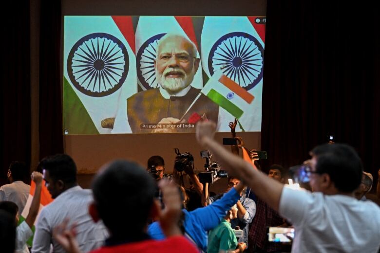 India's Prime Minister Narendra Modi called the historic landing near the moon's south pole a 