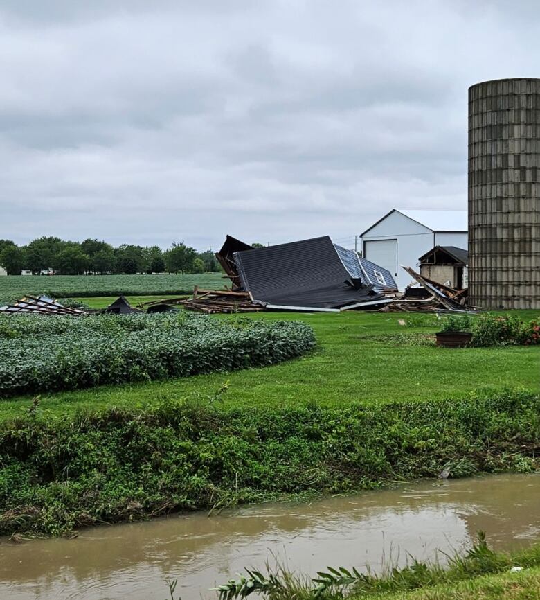 A structure is shown collapsed at Lakeshore Road and County Road 46 in Lakeshore following Thursday night's storm.