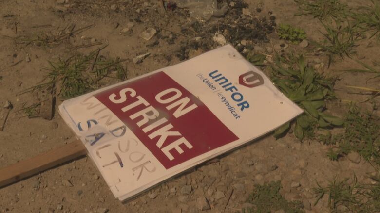 A Unifor strike sign for Windsor Salt is shown on the ground after the union ratified a new five-year agreement on the weekend.