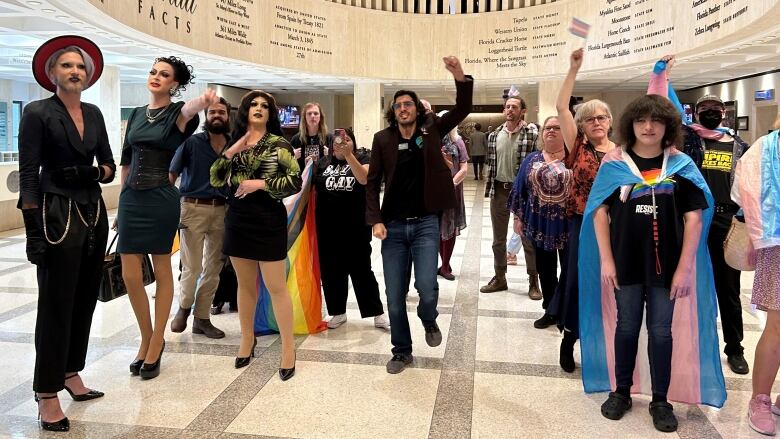 A crowd of LGBT activists protest in front of the Florida House chambers