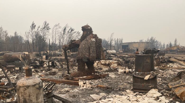 a large figure among rubble