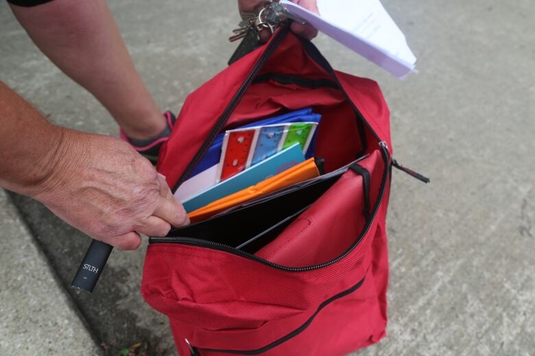 Inside of a backpack. 