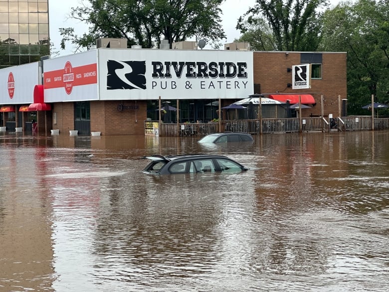 Stranded cars in Bedford, Nova Scotia during the historic flooding in July.