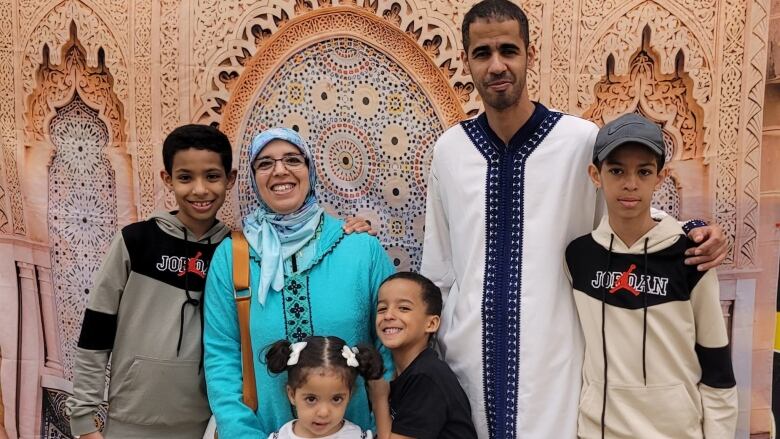 Abdallah Haida's wife and their two younger children Eyad and Razan (front center) are safe in Casablanca but still felt the quake's aftershock.