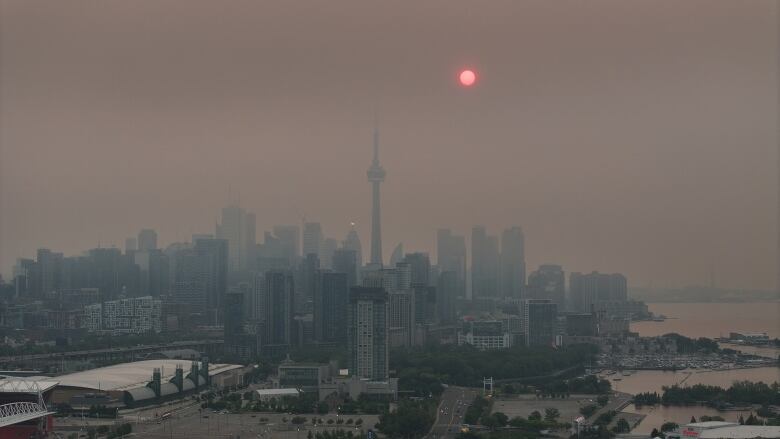 Smoky sunrise skyline of Toronto. 