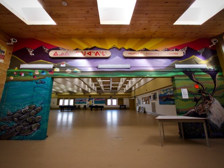 A wide shot of the empty hall