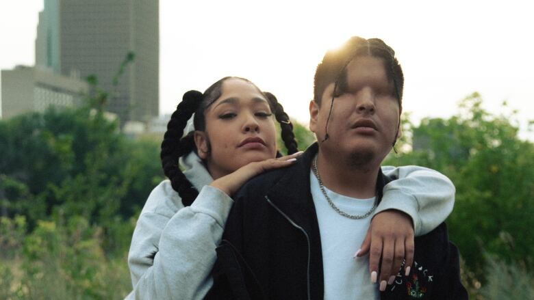 Mariame, left, Cree-Algerian singer-songwriter stands next to Mattmac, right, a blind music producer and recording artist.