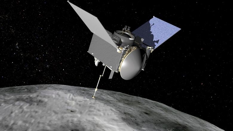 A spacecraft approaches an asteroid.