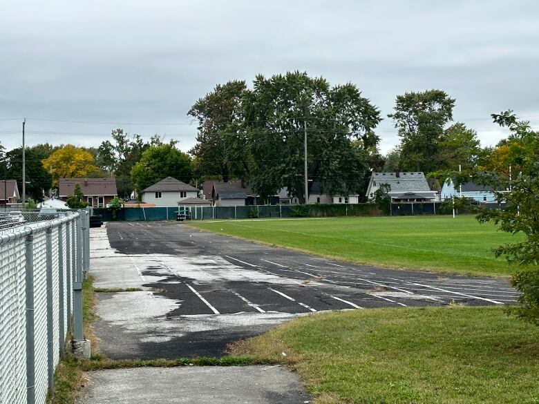 An asphalt track in a field