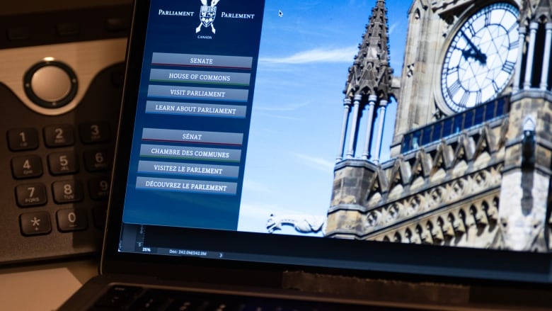 The Canadian Parliament webpage is seen on a laptop , Thursday, Sept. 28, 2023 in Ottawa.  The federal government is coping with apparent cyberattacks this week, as a hacker group in India claims it has sowed chaos in Ottawa.