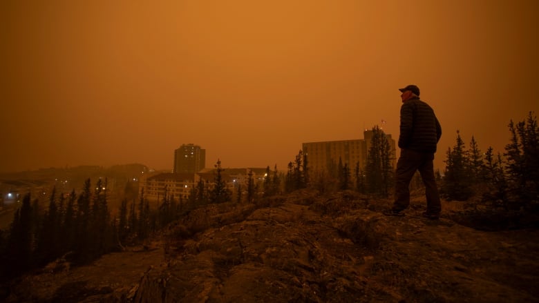 Heavy smoke from wildfires in northern Alberta and British Columbia fill the air over Yellowknife on Sept. 23, 2023. 