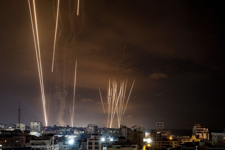 Rockets are fired toward Israel from Gaza City on Saturday.