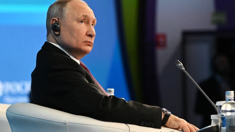 Russian President Vladimir Putin attends the plenary session at the 2023 Russian Energy Week international forum in Moscow, Russia October 11, 2023.  After he speech he spoke about what is happening in Israel and Gaza, and accused the US of failing to achieve peace.