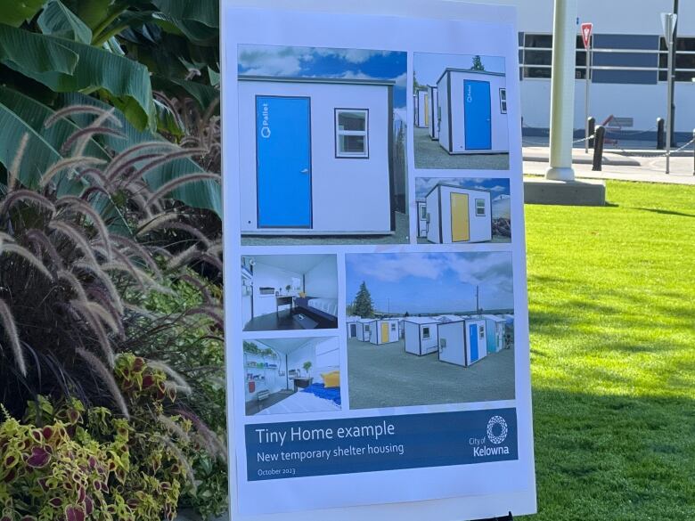 A poster with tiny shelters in a garden. 