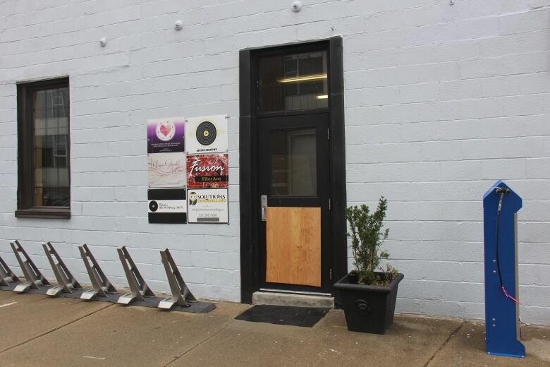 A boarded-up door