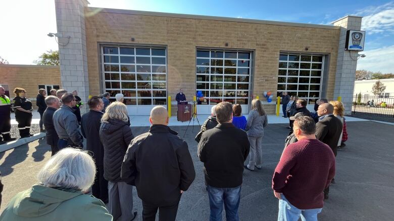 People look on as the new Kingsville EMS station officially opens.