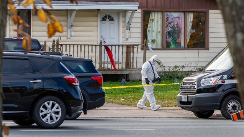 A police forensic unit attends a crime scene on Second Line, in Sault Ste. Marie, Ont., Tuesday, Oct. 24, 2023.