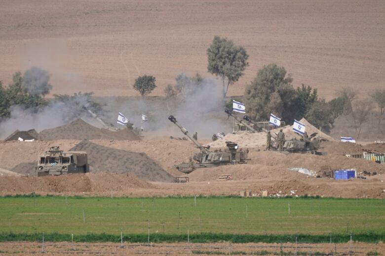 Tanks are seen near the Israel-Gaza border.