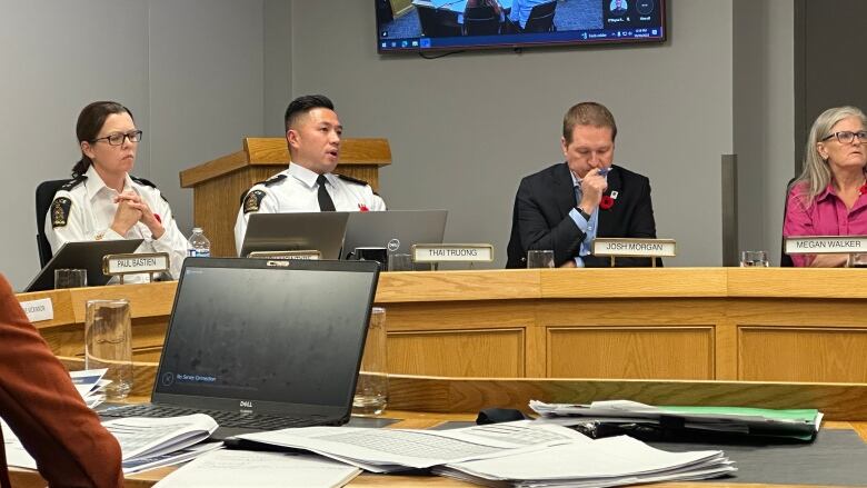 London Police is asking the city for $171 million to add 189 new positions from 2024 to 2027. From left to right: London police Deputy Chief Trish McIntyre, Police Chief Thai Truong, middle left, London Mayor Josh Morgan, middle right, and police service vice-board chair, Megan Walker. 