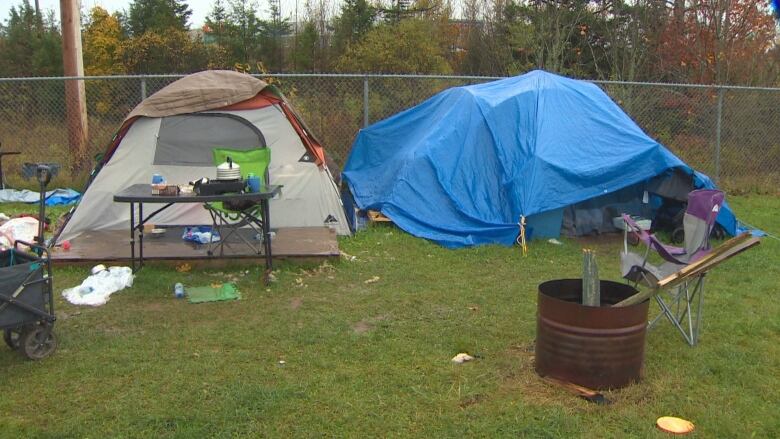 A tent is shown on a field