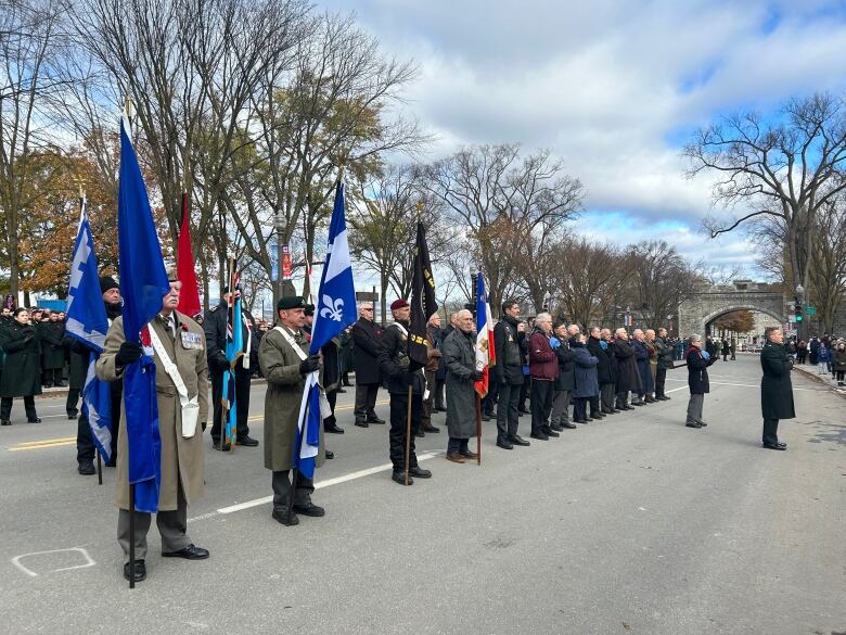 People standing holding flags