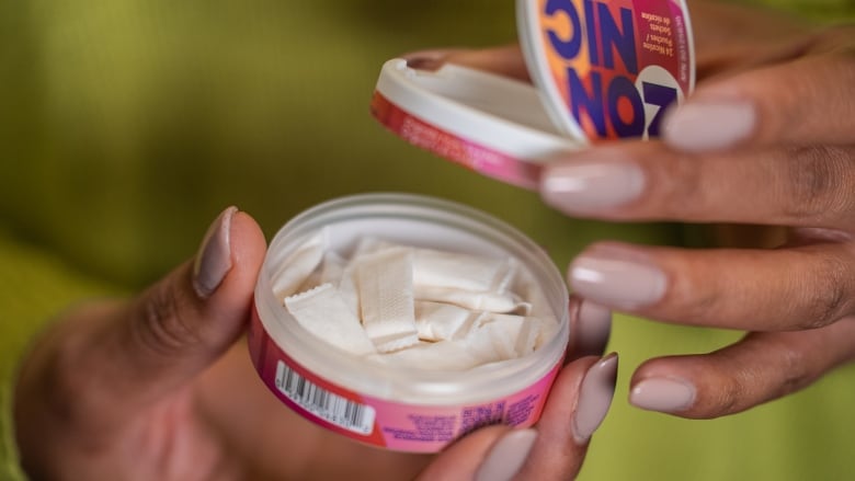 A close up of a case of Zonnic flavoured nicotine pouches. Multiple health groups are concerned the product, which hit Canadian shelves in October, target young people. 