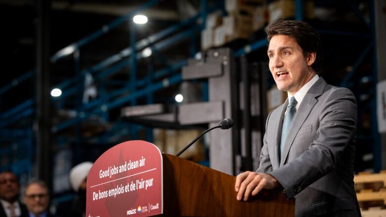 Prime Minister Justin Trudeau speaking from a podium