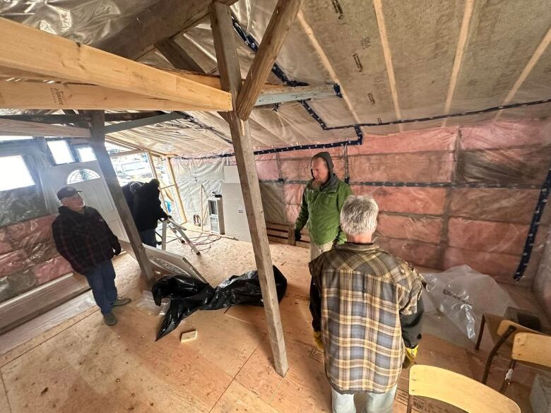 The interior of an insulated wooden building.