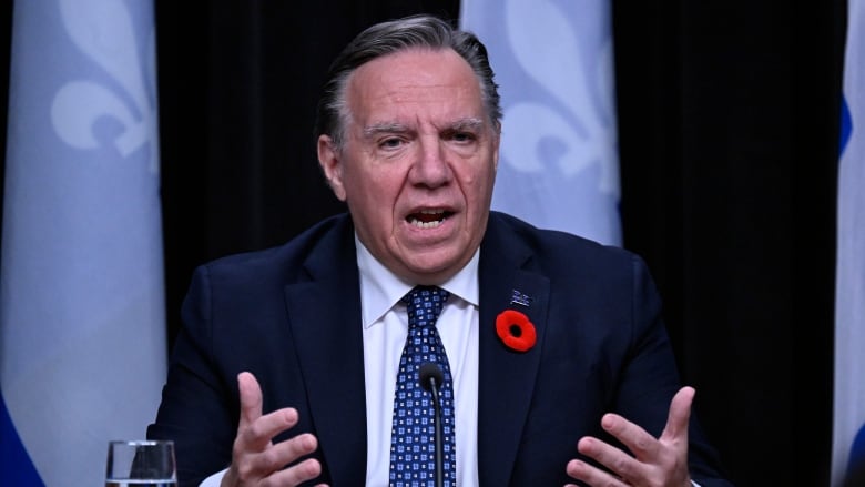 Premier Franois Legault speaking at a news conference. 