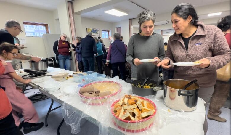 Attendees shared home-cooked meals from a variety of cultures at the event. 